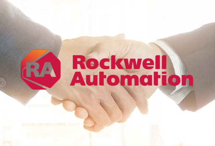 A picture of a handshake with the Rockwell Automation logo on top