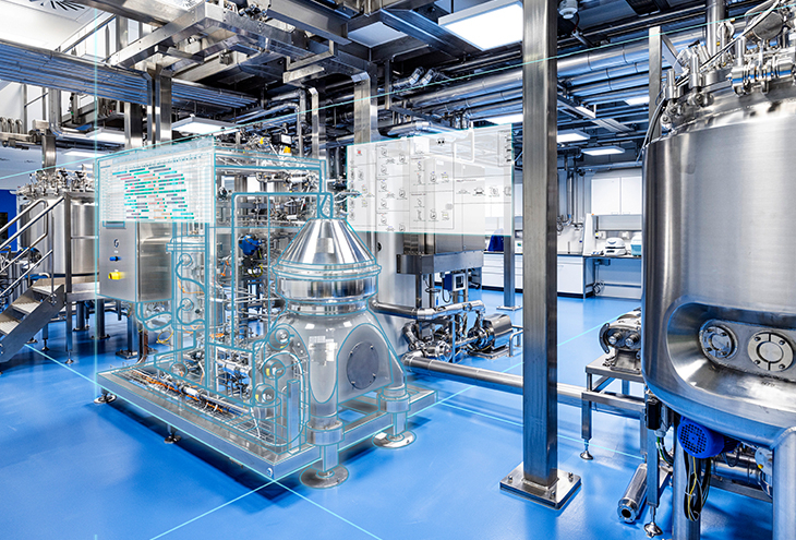 Modern industrial production plant with stainless steel tanks