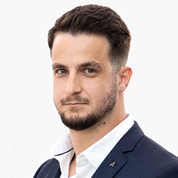portrait picture of tomislav grigic in front of a neutral backgrouond